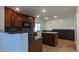 Kitchen with an island and stainless steel appliances at 4730 N 111Th Ln, Phoenix, AZ 85037