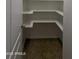 Pantry with white shelving and tile floors at 4730 N 111Th Ln, Phoenix, AZ 85037