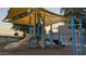 Community playground with shade canopies and climbing structures at 4730 N 111Th Ln, Phoenix, AZ 85037