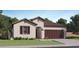 Charming one-story home featuring a well-manicured lawn, a two-car garage, and a neutral color palette at 4732 E Amethyst Ln, San Tan Valley, AZ 85143