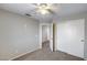 Cozy bedroom featuring a large closet, neutral carpet, and doorway leading to another room at 4948 W Wikieup Ln, Glendale, AZ 85308