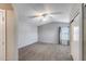 Spacious bedroom featuring a ceiling fan, large closet, and neutral carpet at 4948 W Wikieup Ln, Glendale, AZ 85308