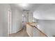 Hallway boasts fresh paint, carpet floors, and easy access to the home's other rooms at 4948 W Wikieup Ln, Glendale, AZ 85308