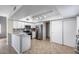 Modern kitchen with stainless steel appliances and white cabinetry, perfect for culinary enthusiasts at 4948 W Wikieup Ln, Glendale, AZ 85308