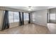 Inviting living area with large windows and neutral colors, creating a comfortable atmosphere at 4948 W Wikieup Ln, Glendale, AZ 85308