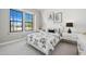 Well-lit bedroom with modern decor, a comfortable bed, and contemporary accents at 521 E Aurora Dr, San Tan Valley, AZ 85140