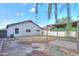 Spacious backyard featuring a partially covered patio, ideal for outdoor relaxation at 537 W Kingman Dr, Casa Grande, AZ 85122
