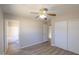 Bedroom features ceiling fan, updated flooring, and neutral paint at 537 W Kingman Dr, Casa Grande, AZ 85122