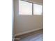Bedroom features a frosted window and neutral paint at 537 W Kingman Dr, Casa Grande, AZ 85122
