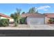 Charming single-story home featuring a well-maintained yard and a two-car garage at 537 W Kingman Dr, Casa Grande, AZ 85122