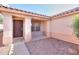Inviting covered front porch that leads to the front door of a single Gathering home at 537 W Kingman Dr, Casa Grande, AZ 85122