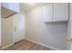 Laundry area with storage at 537 W Kingman Dr, Casa Grande, AZ 85122