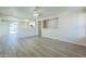 Bright and open living room featuring modern flooring and neutral paint at 537 W Kingman Dr, Casa Grande, AZ 85122