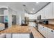 Well-lit kitchen featuring granite countertops, stainless steel appliances, and ample cabinet space at 7435 W Trails Dr, Glendale, AZ 85308