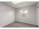 Bedroom featuring carpet, neutral walls, and a bright window at 7526 W Windrose Dr, Peoria, AZ 85381
