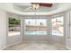 Bright sunroom offering stunning views of the backyard pool and outdoor space at 7526 W Windrose Dr, Peoria, AZ 85381