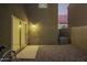 Backyard area with gravel and an exterior air conditioning unit at 8253 W Illini St, Phoenix, AZ 85043