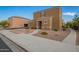 Charming two-story home with desert landscaping, neutral tones, and a welcoming front porch at 8253 W Illini St, Phoenix, AZ 85043