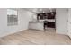 Modern kitchen featuring dark cabinetry, stainless steel appliances, and granite countertops at 8253 W Illini St, Phoenix, AZ 85043