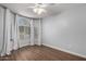 Empty bedroom with wood floors, bright windows, and soft natural light at 840 E Baylor Ln, Chandler, AZ 85225