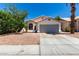 Charming single-story home with a two-car garage and low maintenance desert landscaping at 840 E Baylor Ln, Chandler, AZ 85225