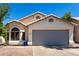 Charming single-story home with a two-car garage, neutral paint, and desert landscaping at 840 E Baylor Ln, Chandler, AZ 85225