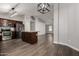 Open-concept kitchen with stainless appliances, granite countertops, and a center island at 840 E Baylor Ln, Chandler, AZ 85225