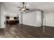 Inviting living space with wood flooring, neutral paint, and access to the kitchen at 840 E Baylor Ln, Chandler, AZ 85225
