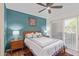 Cozy bedroom with modern decor, bedside tables, and a sliding glass door at 9450 E Becker Ln # 1046, Scottsdale, AZ 85260