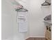 Walk-in closet with wood floor, white walls, clothing rack and shelf at 9450 E Becker Ln # 1046, Scottsdale, AZ 85260