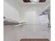 Walk-in closet with built-in shelving and wood flooring at 9450 E Becker Ln # 1046, Scottsdale, AZ 85260
