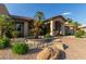 Beautifully landscaped community entrance with a fountain and well-maintained landscaping at 9450 E Becker Ln # 1046, Scottsdale, AZ 85260