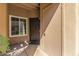 Private entryway area with a window, door, and utility closet at 9450 E Becker Ln # 1046, Scottsdale, AZ 85260