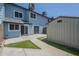 Backyard with patio and faux grass area, plus shed at 10101 N 91St Ave # 111, Peoria, AZ 85345