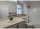 Bathroom with vanity and sink, toilet, and shower/tub combo with tile at 10101 N 91St Ave # 111, Peoria, AZ 85345