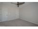 Bedroom with ceiling fan and two large closets at 10101 N 91St Ave # 111, Peoria, AZ 85345