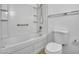 Well-lit bathroom featuring a shower-tub combination and white toilet at 13810 N 39Th Ave, Phoenix, AZ 85053