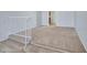 Bright living room features carpeted floors, staircase, and neutral paint at 13810 N 39Th Ave, Phoenix, AZ 85053