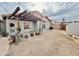 Backyard featuring a storage shed and a covered patio at 14345 N 101St St, Scottsdale, AZ 85260