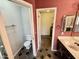 Bathroom featuring a toilet and vanity with sink at 14345 N 101St St, Scottsdale, AZ 85260