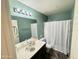 Bathroom with an over-sized vanity and shower with tub combo at 14345 N 101St St, Scottsdale, AZ 85260