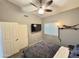 Relaxing bedroom with a ceiling fan at 14345 N 101St St, Scottsdale, AZ 85260