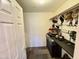 Walk-in closet with storage for clothing and accessories at 14345 N 101St St, Scottsdale, AZ 85260