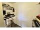 Small closet that has been repurposed as an office with a small desk at 14345 N 101St St, Scottsdale, AZ 85260