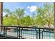 Relaxing balcony with views of mature trees and neighborhood scenery at 16 W Encanto Blvd # 26, Phoenix, AZ 85004