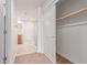 Bathroom with walk-in shower, soaking tub, and access to closet and a second entry at 16 W Encanto Blvd # 26, Phoenix, AZ 85004