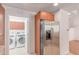 Adjacent laundry room with a stainless-steel refrigerator at 16 W Encanto Blvd # 26, Phoenix, AZ 85004