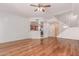 Bright living room features hardwood floors, stairs and an adjacent kitchen at 16 W Encanto Blvd # 26, Phoenix, AZ 85004