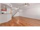 Open-concept living area with hardwood floors and stainless appliances at 16 W Encanto Blvd # 26, Phoenix, AZ 85004