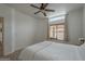 Neutral bedroom with a fan and natural light from window with view at 1650 S Crismon Rd # 63, Mesa, AZ 85209